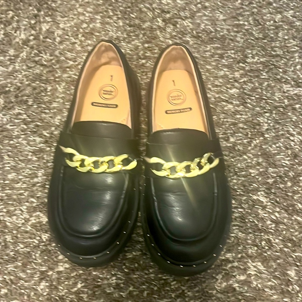 Girls’ size 1 black platform loafers. Worn once.